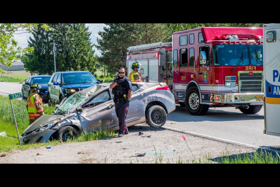 Single vehicle rollover on 5th Sideroad has sent 2 to hospital and the search is on for a lost puppy that's fled the scene. Paul Novosad for Bradford Today.