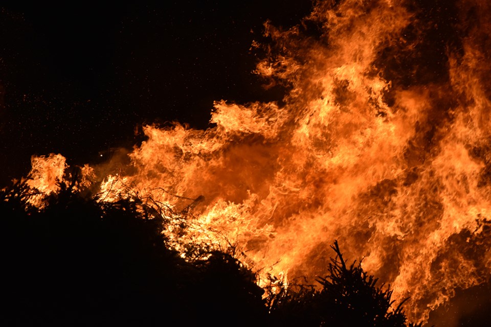 Flames leap into the night sky. Miriam King/Bradford Today