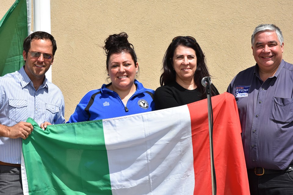 Raising the Italian flag for Festa della Repubblica is BWG Coun. Peter Ferragine, from left, Vanessa Paulino, Jeanny Salmon, trustee with the Simcoe Muskoka Catholic District School Board, and York-Simcoe MP Peter Van Loan. Miriam King/Bradford Today