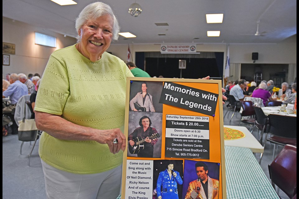 Danube Seniors Leisure centre president Gertrud Erdenberger, with a reminder of the upcoming Memories of the Legends Concert, Sept. 29. Miriam King/BradfordToday