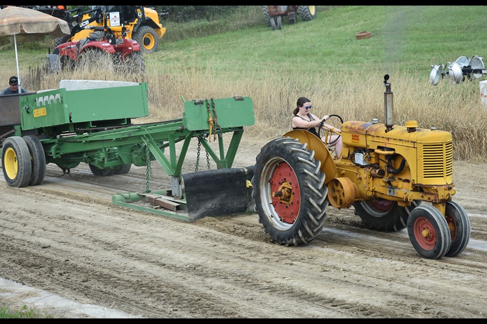 Diane Baverstock of Gravenhurst pulls the sledge 159.8' down the Cookstown track, in a vintage tractor pull. Miriam King/BradfordToday