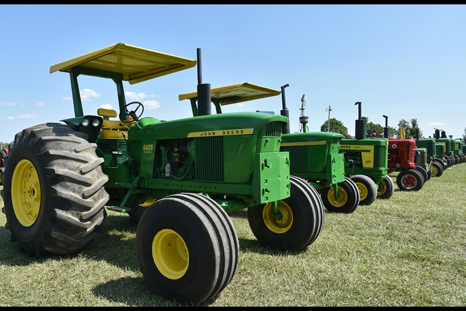 A line of John Deere tractors (with one red exception). | Miriam King/BradfordToday