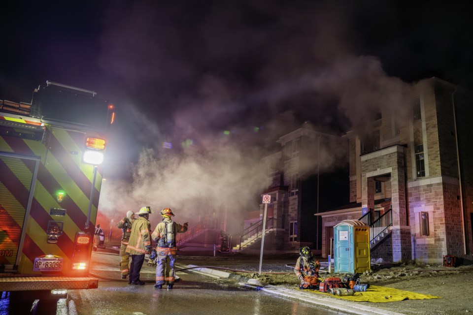 Bradford Fire crews rush to the scene of two structure fires in a new subdivision in Bond Head. Paul Novosad for BradfordToday.