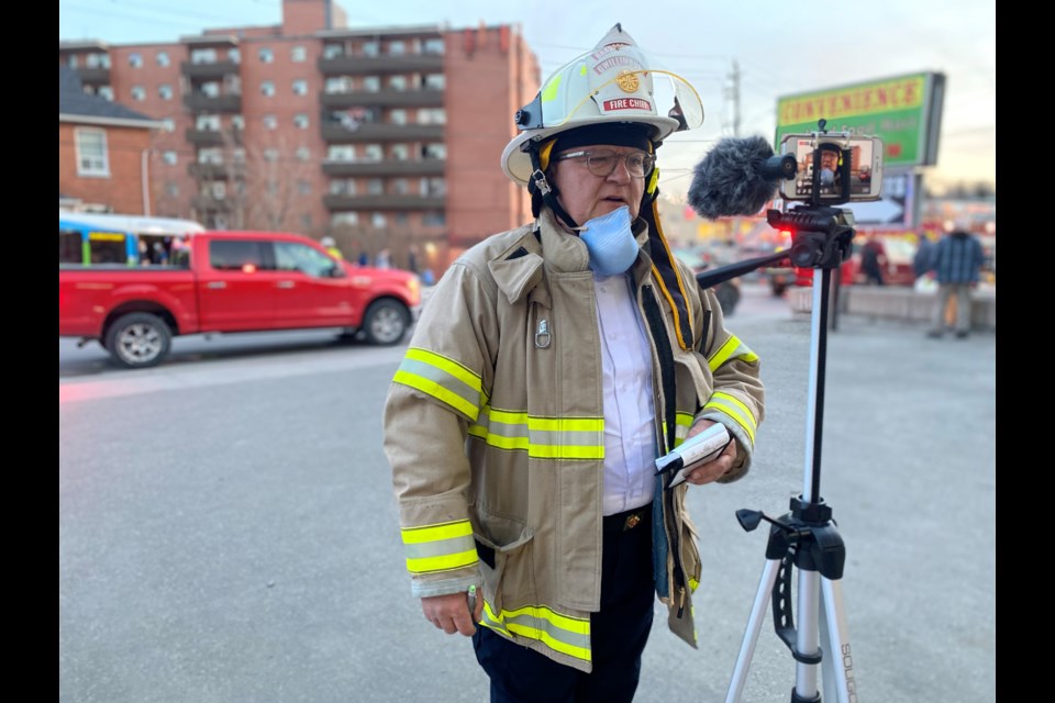 Fire Chief Jim Kay provides an update on Monday evening at 114 Holland Street. 