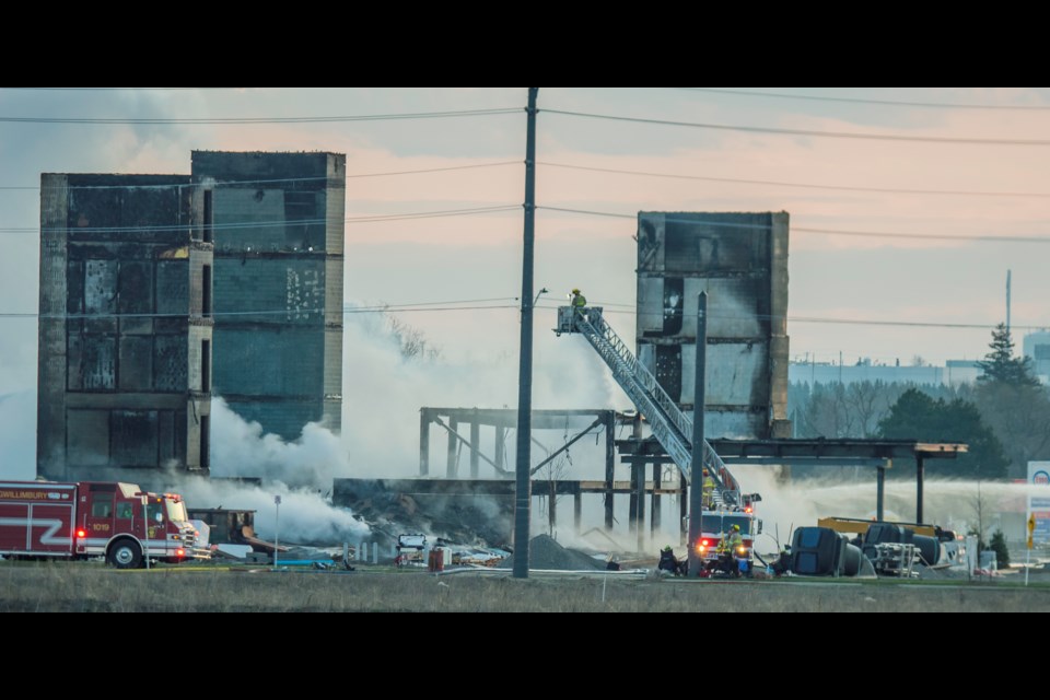 At 6:45 a.m. all that remains are the concrete block stairwells and some structural steel. Paul Novosad for Bradford Today.