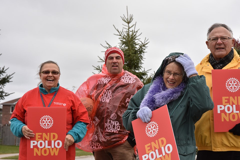 From right, Innisfil Rotarians Eric Jagger, Chris Begg, Doug Weber and Marlene Mills walking to End Polio on World Polio Day, Oct 24. Miriam King/BradfordToday