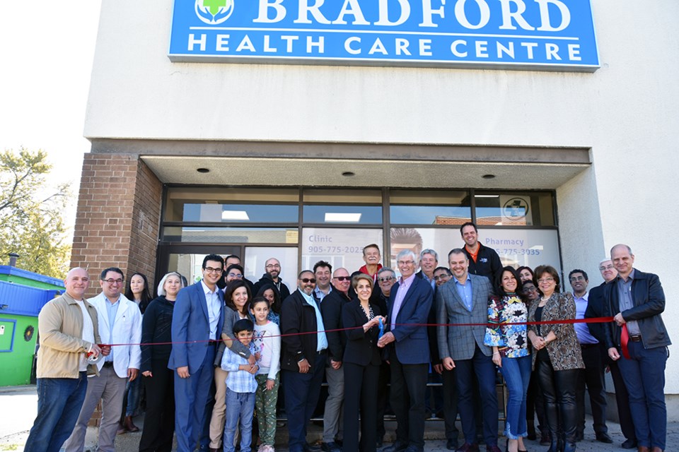 Mayor Rob Keffer and Dr. Nobari cut the ribbon outside the new Bradford Health Care Centre on Holland Street East. Miriam King/Bradford Today