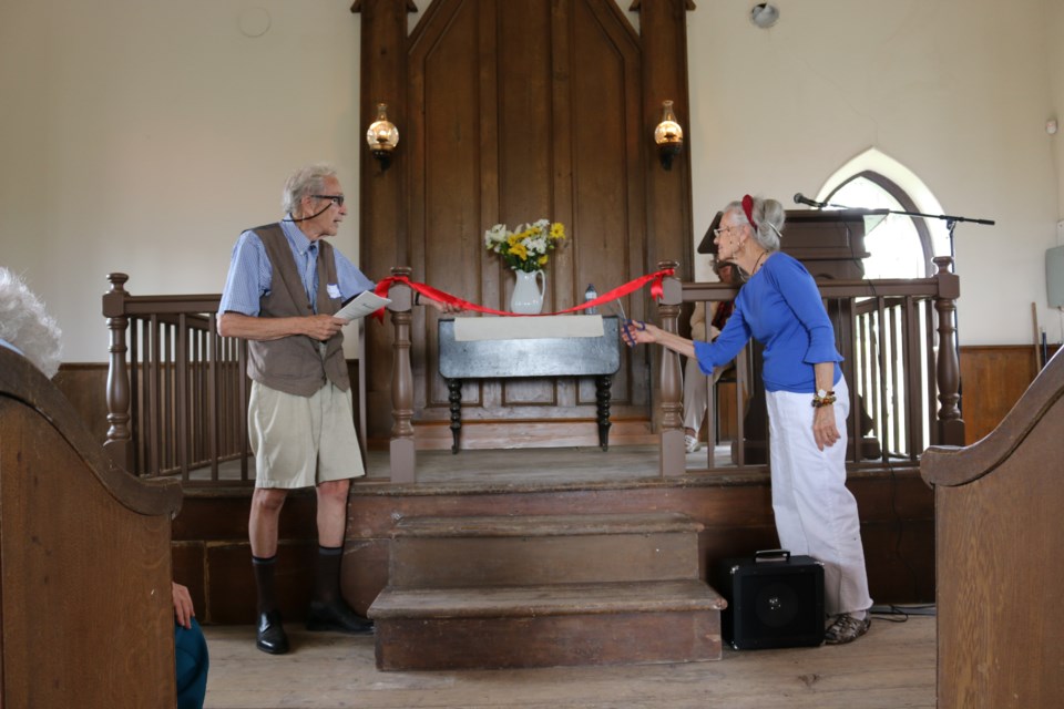 Ribbon cutting for the grand re-opening of the Auld Kirk