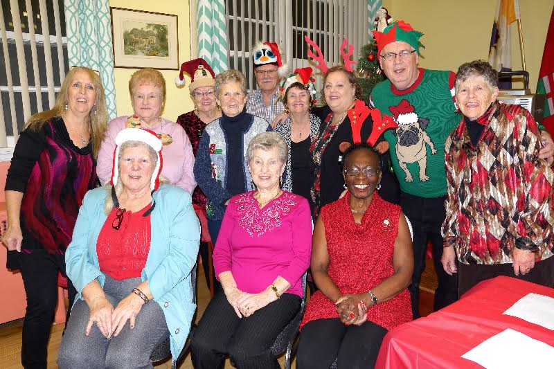 The Happy 60's Seniors bid euchre club in Bradford West Gwillimbury celebrates Christmas. Submitted photo