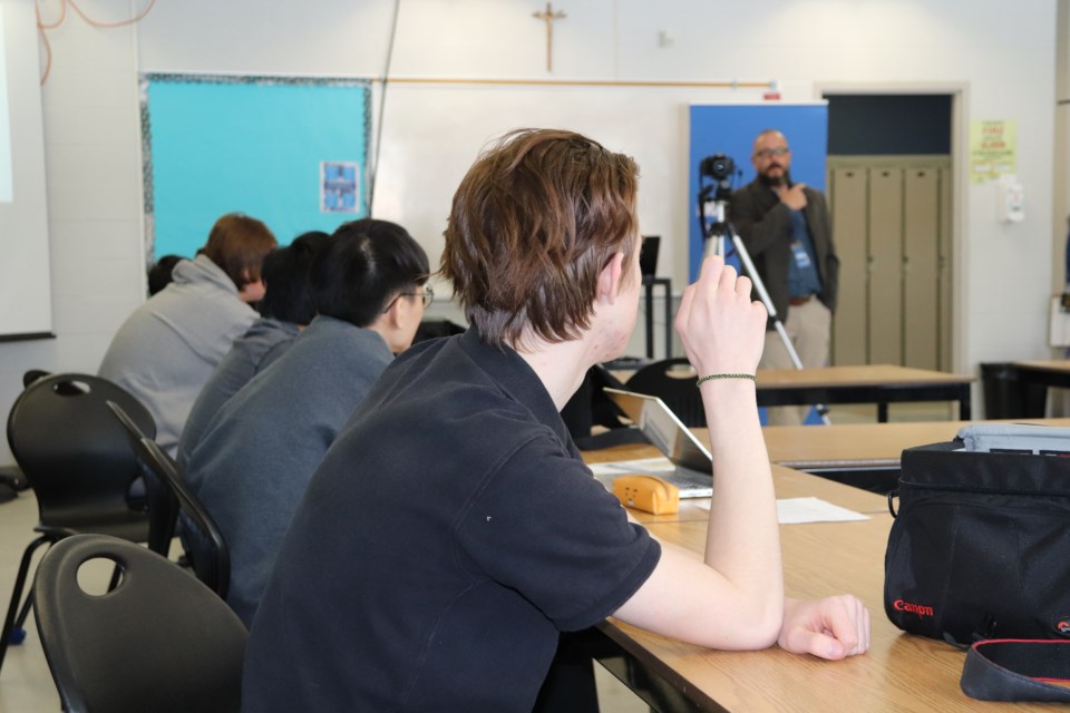 Students from Holy Trinity get a lesson in photography from BradfordToday's freelance photographer Dave Kramer. Sydney Fabbricino for BradfordToday