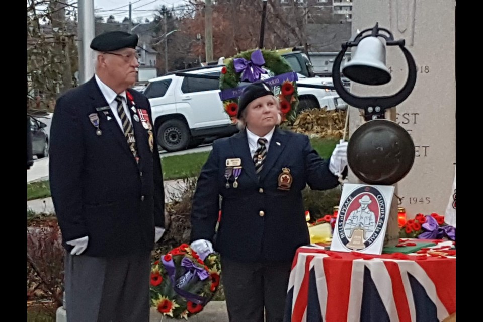 A bell was run 100 times outside the Royal Canadian Legion in Bradford West Gwillimbury on Nov. 11 to mark 100 years since the end of the First World War. Trinity Anglican Church also rang its bell, along with many others around Canada. Submitted photo/Mike Giovanetti