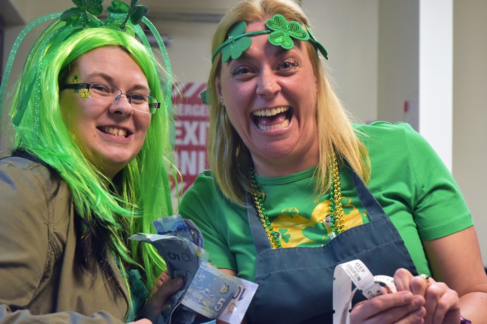 Legion secretary Laura Hollingshead, left and Mandy Turner get into the St. Patrick's Day spirit at the Bradford Legion. Miriam King/Bradford Today