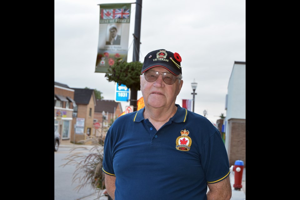 Veterans Service Officer George Neilson oversaw the hanging of the Veterans Banners. 