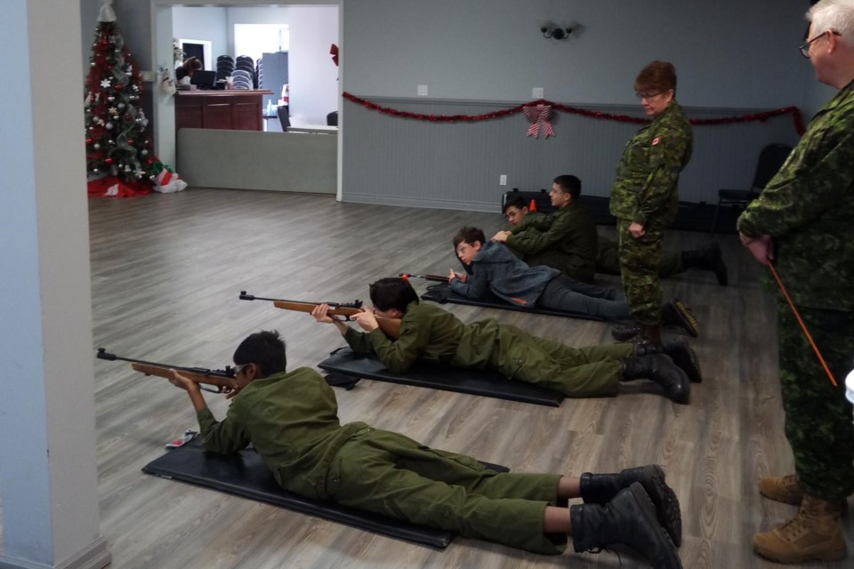 Cadets get familiar with Daisy air rifles.