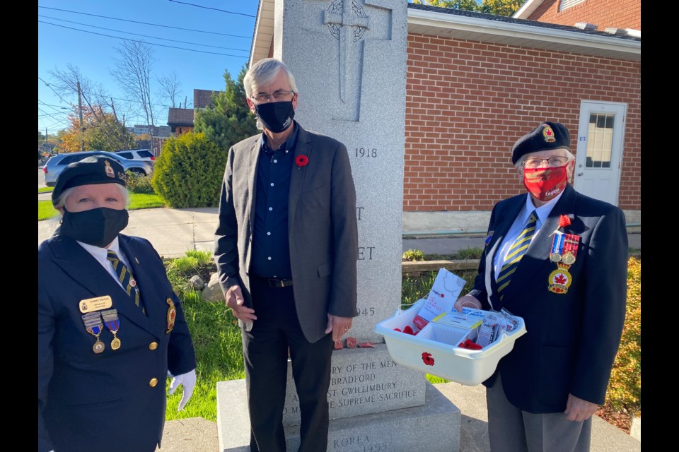 Mayor Rob Keffer with Bradford Legion President Tammy Paglia and Poppy Campaign Chair Anne Silvey outside the Bradford Legion 