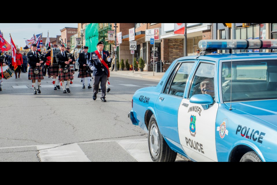 Mike Giovanetti leads the group down Holland Street. Paul Novosad for Bradford Today.