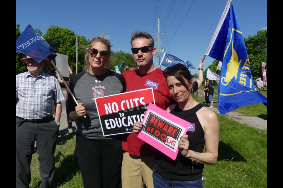 Protesting teachers Laura Cipolla, from left, Doug Brydie, and Julie Brydie. Jenni Dunning/BradfordToday