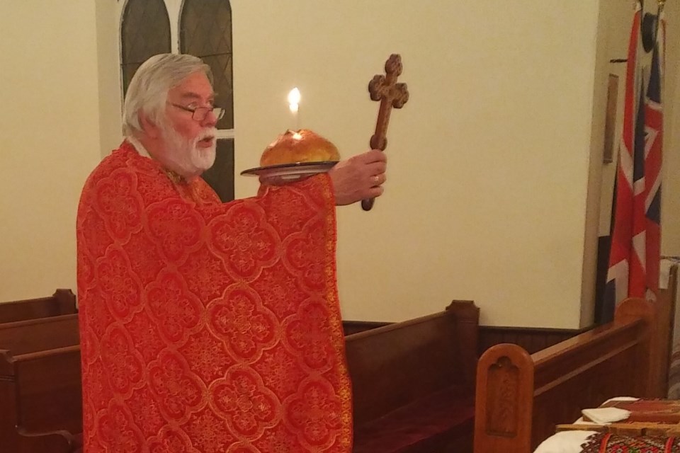 Monsignor Conrad Dachuck, the pastor of St. Catherine of Alexandria Catholic Church, conducted a liturgy Feb. 6 in commemoration of Rev. Canon Featherstone Lake Osler. Submitted photo 