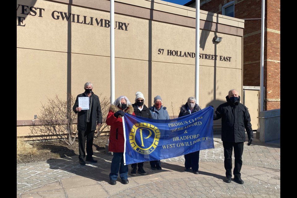 Mayor Rob Keffer with select members of Bradford Probus Clubs for the annual flag-raising ceremony. 