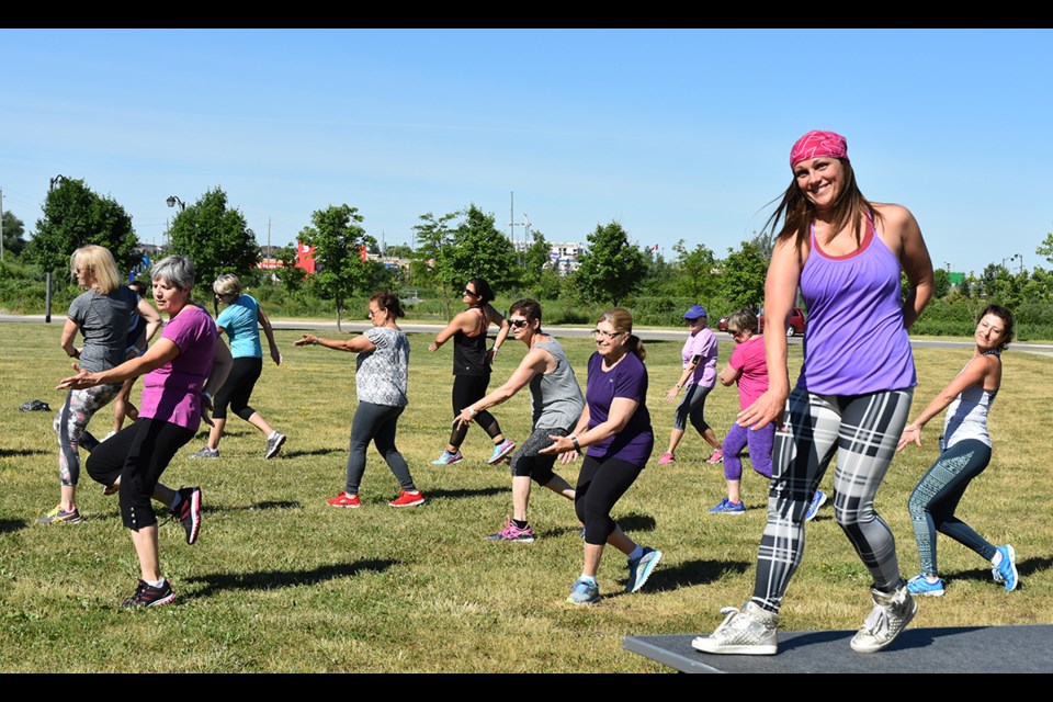 Zumba instructor Julia Basden leads outdoor Zumba on the west lawn at the Bradford West Gwillimbury Public Library on June 25. Miriam King/Bradford Today