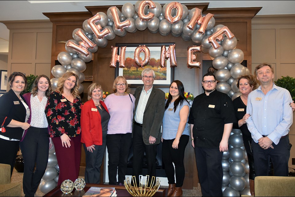 Staff at Holland Gardens retirement residence welcome BWG Mayor Rob Keffer, centre, and first resident Jill MacRae. Miriam King/Bradford Today