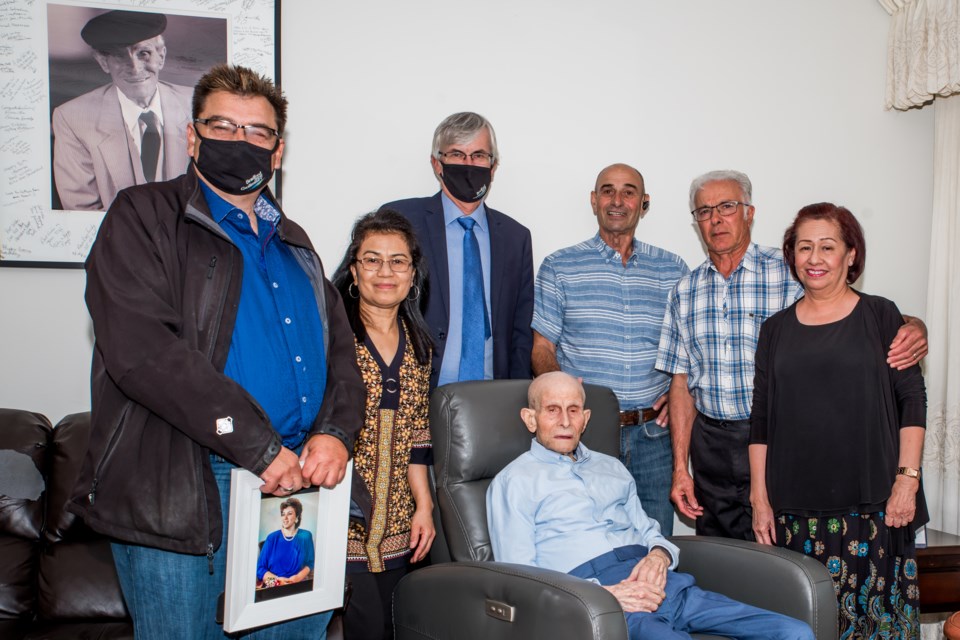 Lorenzo with caregivers Shane and Rita, son Giuseppe and son-in-law Frank, Mayor Rob Keffer and Councillor Peter Dykie. Paul Novosad for Bradford Today.