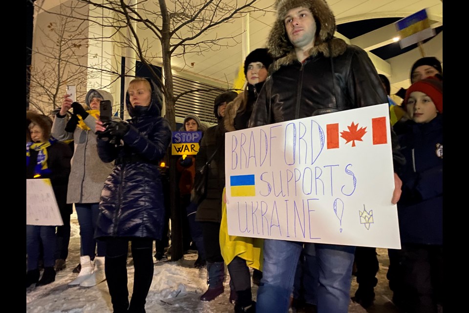 Bradford raises the Ukrainian flag Saturday Feb. 26 at the Leisure Centre.