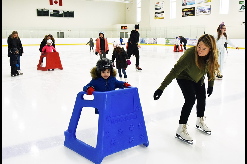 Minnie Mouse and Batman join Bradford students at family skate (4 photos) -  Bradford News