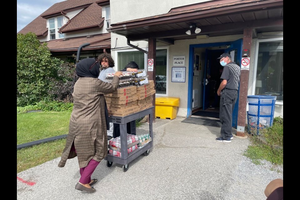 Pizza lunch delivered to Blue Door Shelter and the BWG Library Staff