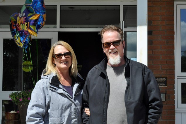 Pastor Tim Walker and his wife Jackie Walker pose in front of the Bradford Baptist Church where Tim has pastored for 35 years. Jackie Kozak for BradfordToday