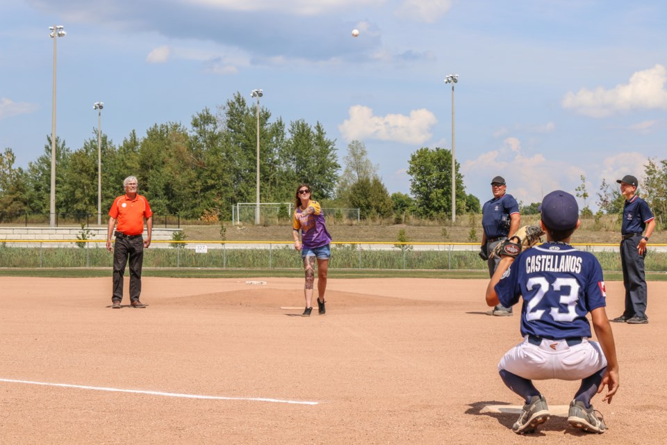 First pitch thrown by Gary Baynes' daughter, Alysha