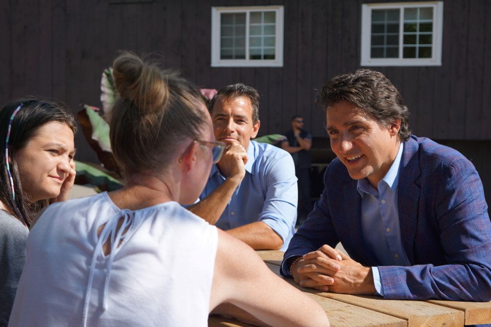 Prime Minister Justin Trudeau and Milton MP Adam van Koeverden met with several families at Springridge Farm in Milton on Monday. 