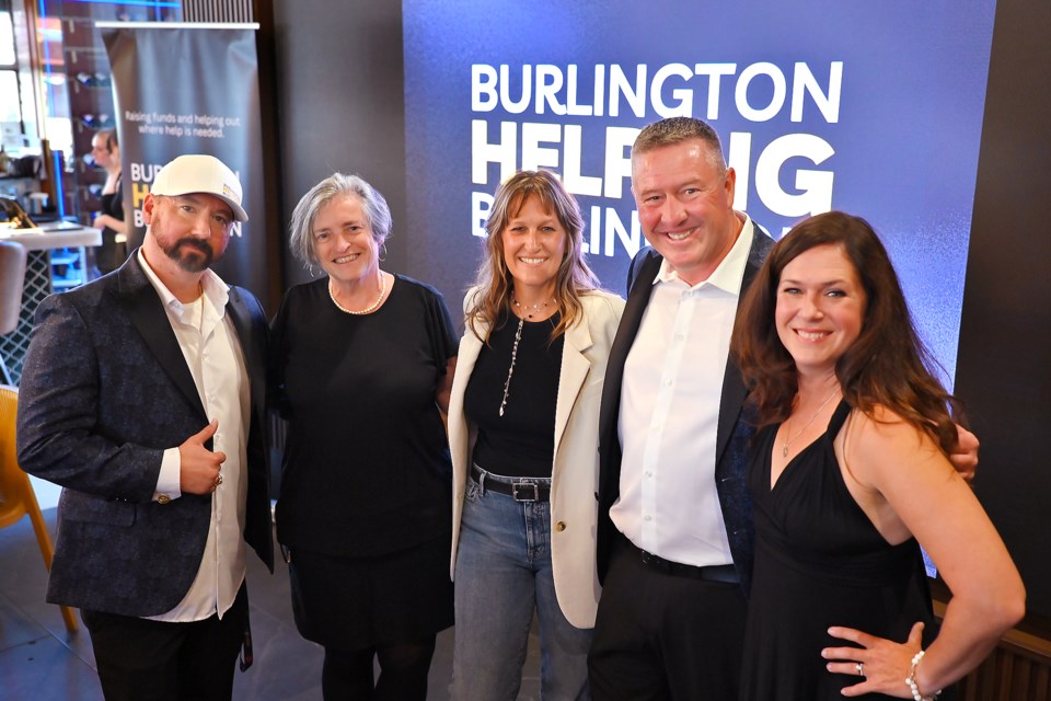 Burlington Helping Burlington celebrated its one-year anniversary with a special event at Squires Gastro Bistro Saturday evening where they announced that they have obtained official Charitable Status. Mayor Marianne Meed Ward (centre ) gathers with Burlington Helping Burlington Founding Members Michael Desjardins, Vicki Trottier, Sean Campbell and Julie Neal.