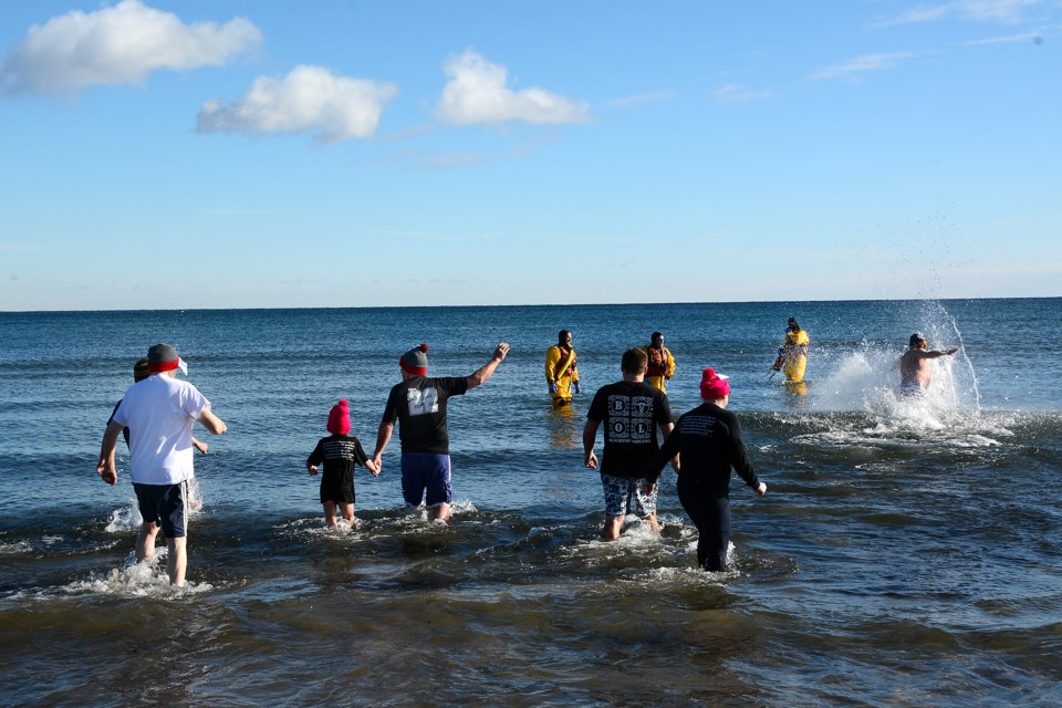 A polar plunge into Hood Canal starts 2022 for Seabeck residents