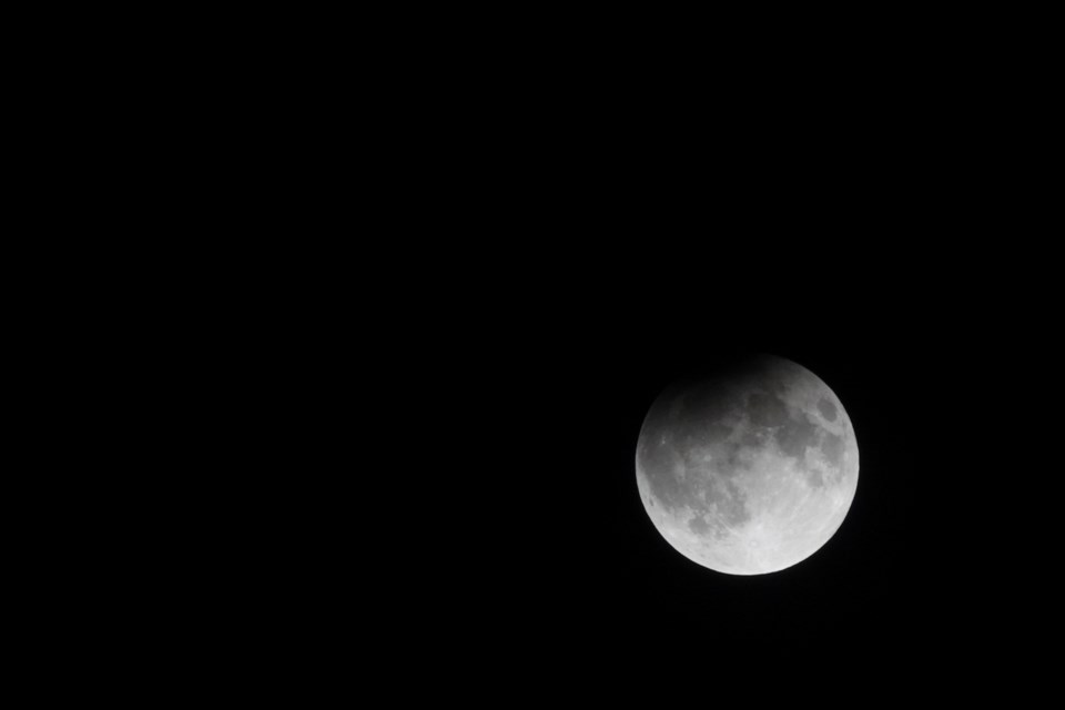 Partial lunar eclipse as seen from Burlington last night. This was around 10:30 p.m. The next photo was taken hours after.