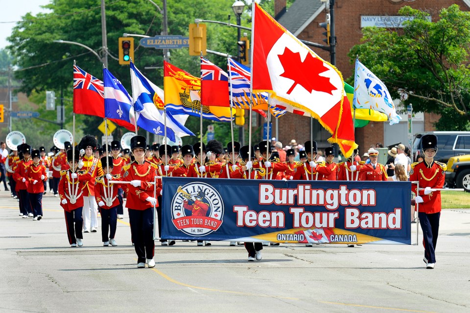 Family fun at Burlington's Sound of Music festival parade, midway