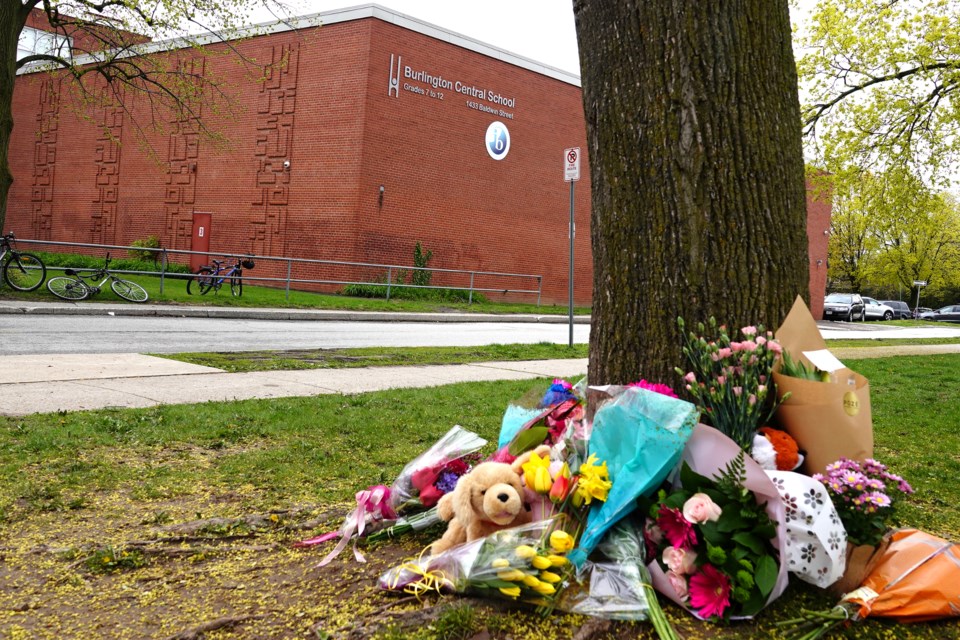 A memorial has been assembled in front of Central Public School, where an 8-year-old girl died after being struck by a car on May 3.