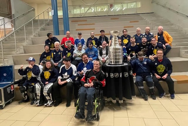 Special Olympics Burlington Bobcats' floor hockey team had a visit from Mario Della-Savia and the Stanley Cup at their last practice of the season Tuesday.