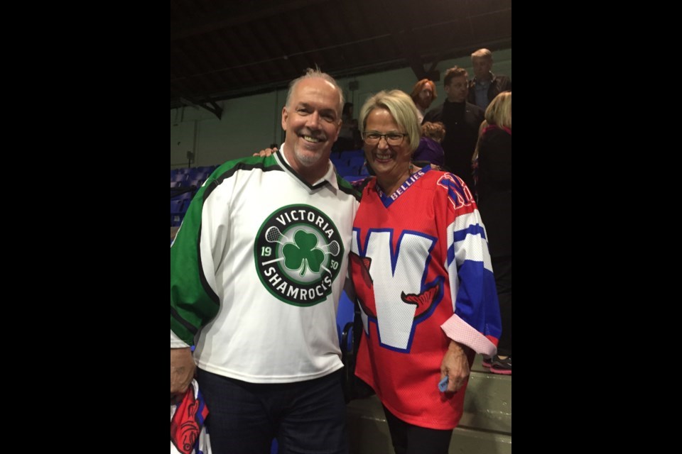 John Horgan started out watching a lacrosse game at Queen's Park Arena in a Salmonbellies jersey - only to reveal a Shamrocks jersey underneath.