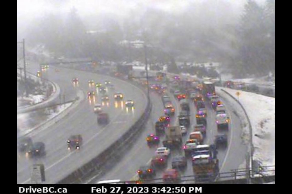 This DriveBC highway camera shows snow and traffic already building on Highway 1 near Kensington in Burnaby. 