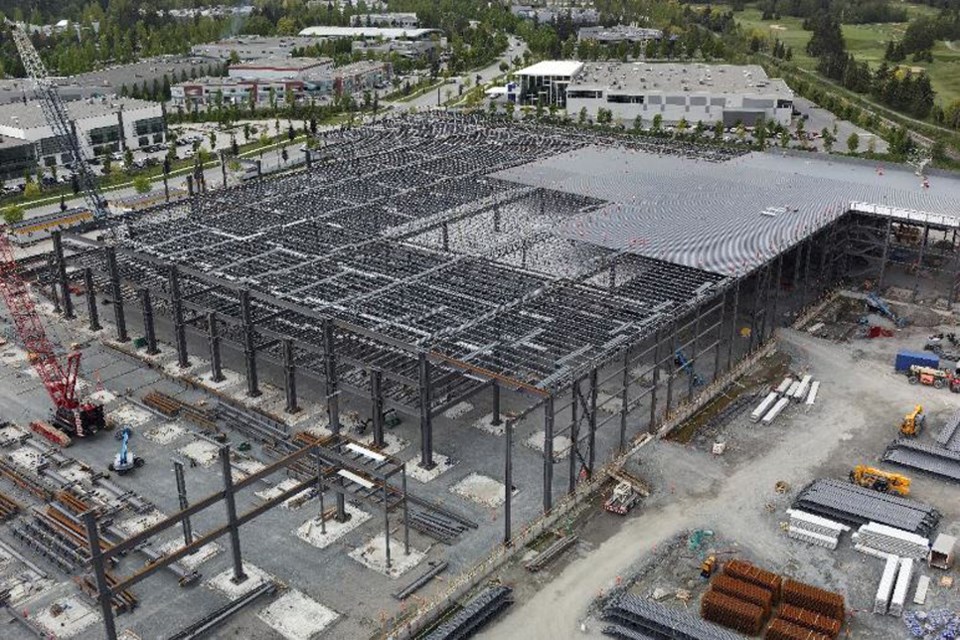 A photo shows an aerial view of a warehouse under construction at 5255 N Fraser Way where a worker fell to his death in May 2022.