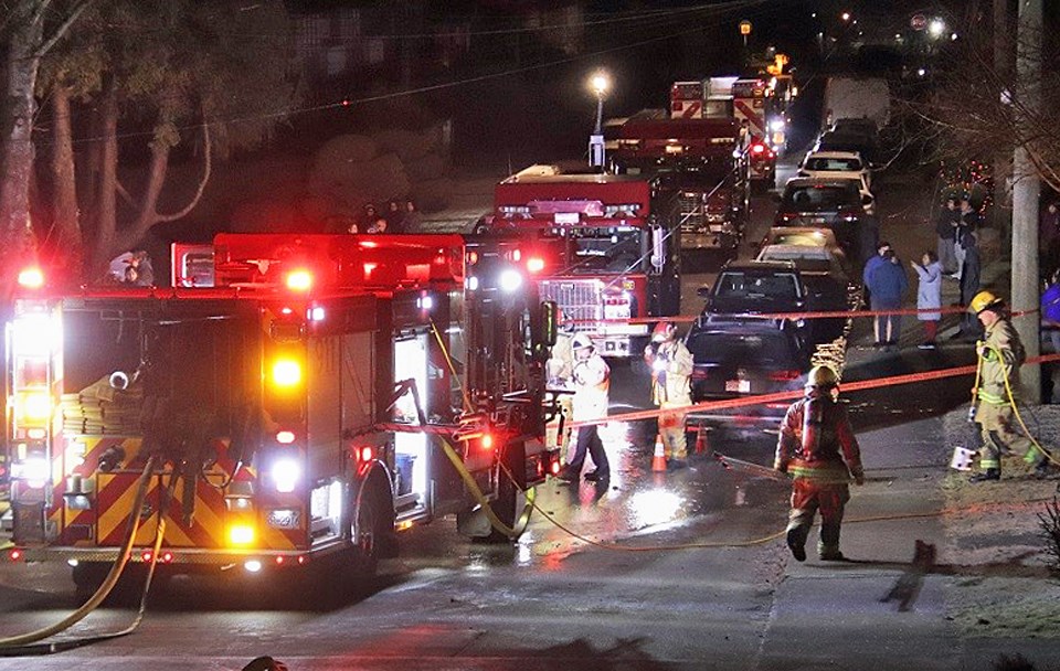 Burnaby fire crews respond to a carport fire in the 5600 block of Woodsworth Street on Thursday night.