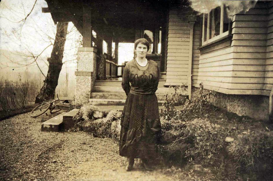 Alice Travers (also know as "Mam Tabs") poses for a photograph outside the Travers family home at 7828 Stanley St.