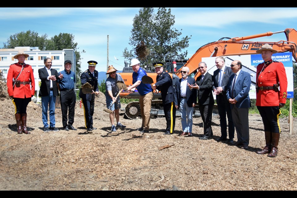 Local politicians and RCMP brass break ground on the new Burnaby RCMP building Tuesday.