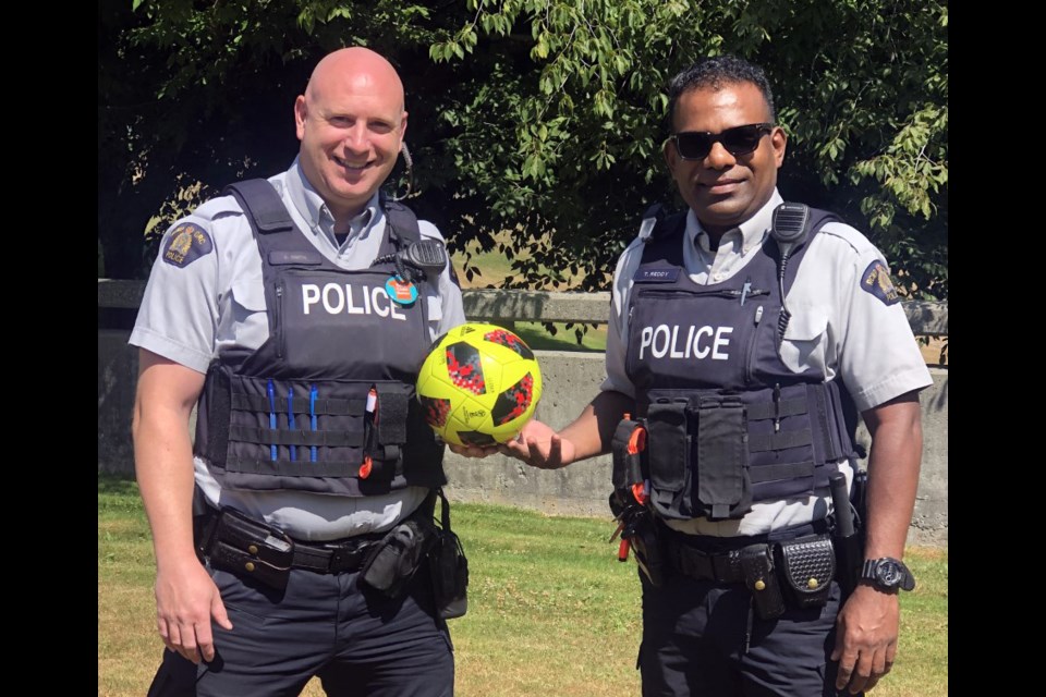 Ex-Vancouver Whitecap Const. Dave Morris (left) and Const. Tulsi Reddy are ready to kick off the Burnaby RCMP youth soccer academy next week after a one-year COVID-19 hiatus.