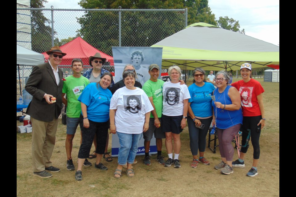 Volunteers come together to celebrate the 42nd Terry Fox Run at Riverside Park in Cambridge on Sunday.                                