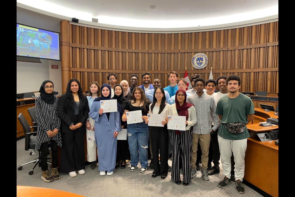 Participants in the YouthForce program celebrate their work at an end of summer graduation.