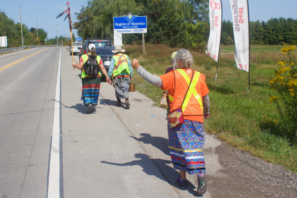 Walkers make their way into Waterloo region on Tuesday.