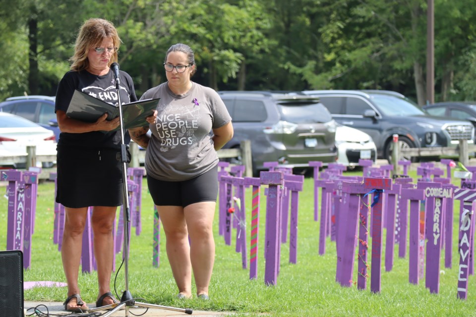 Melina Pearson (left) and Emma Horner (right) give speeches at the event in Soper Park