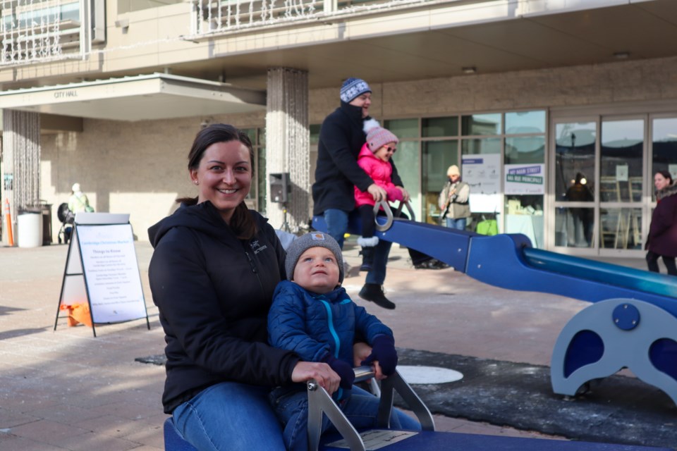 The Ward family tries out the e/motion display at city hall